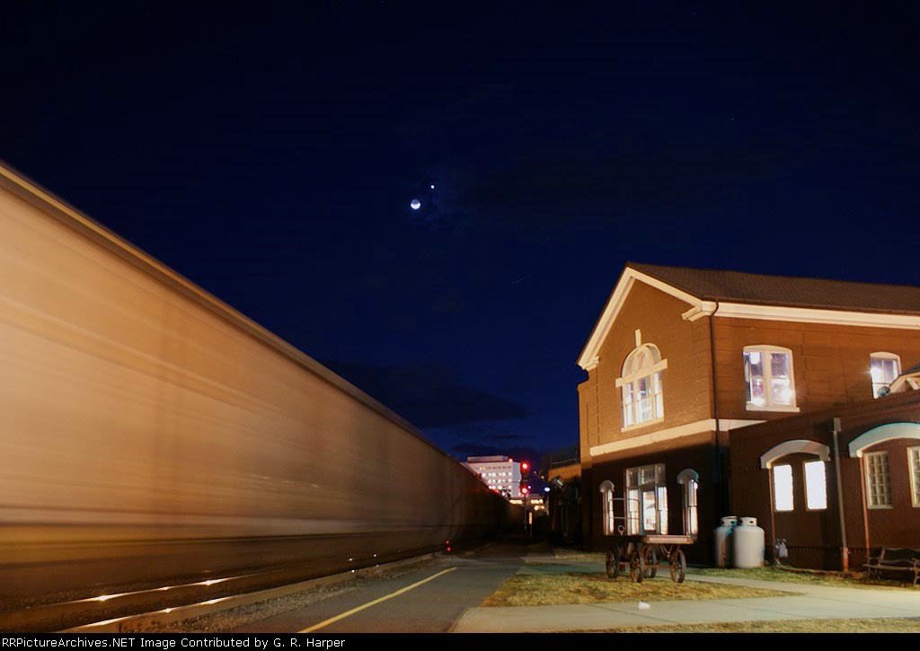 a-crescent-moon-and-venus-hover-over-a-westbound